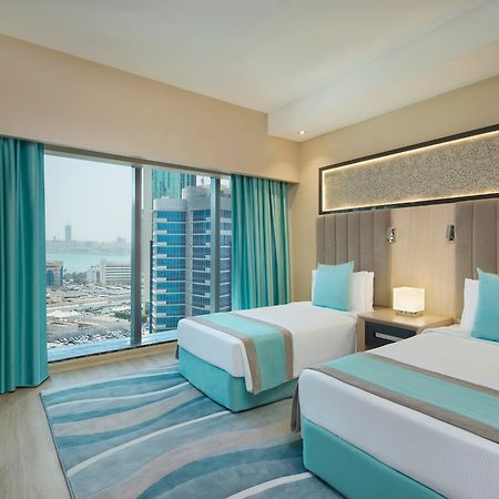 Wyndham Doha West Bay Hotel Exterior photo Deluxe Room