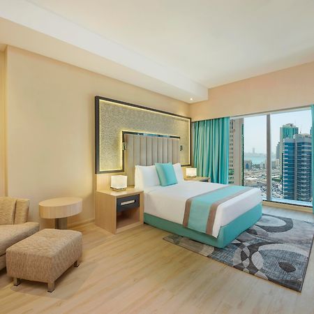 Wyndham Doha West Bay Hotel Exterior photo Deluxe Room