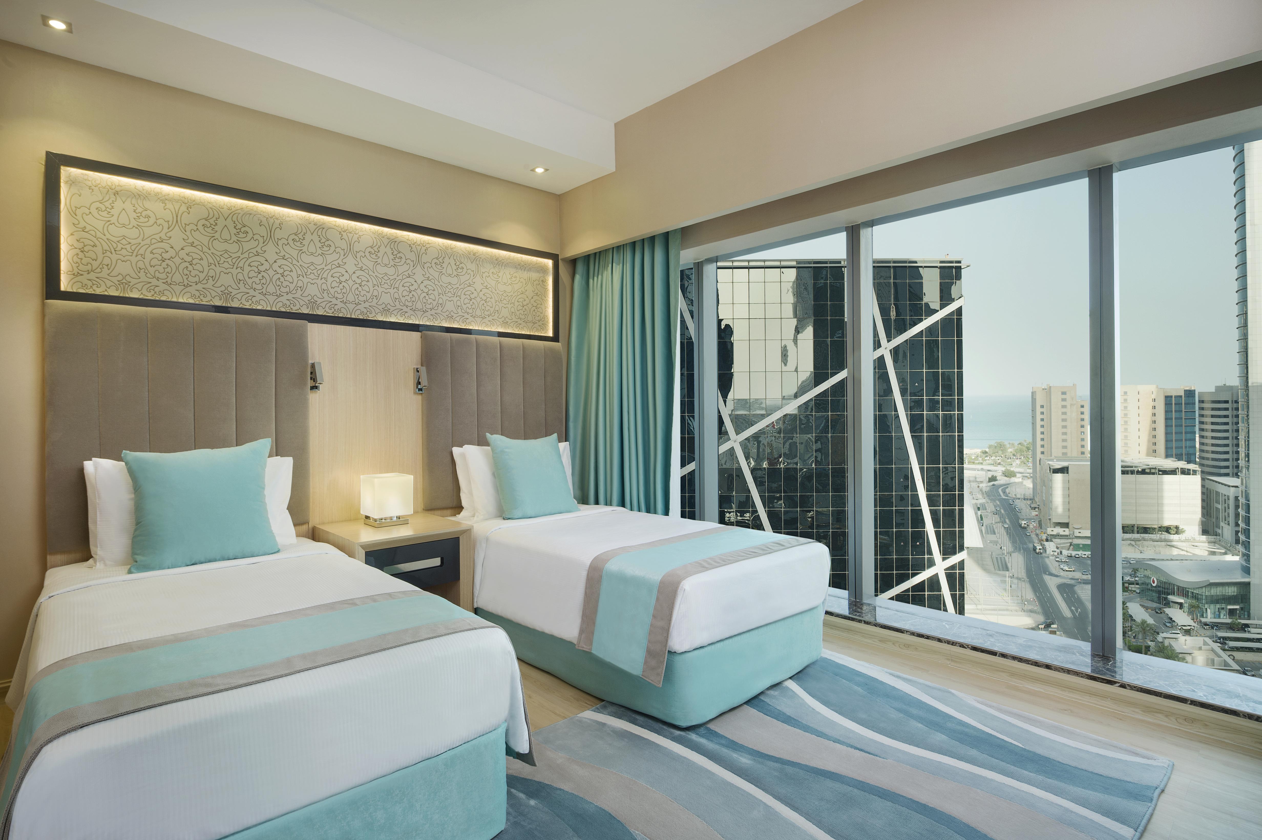 Wyndham Doha West Bay Hotel Exterior photo Deluxe Room
