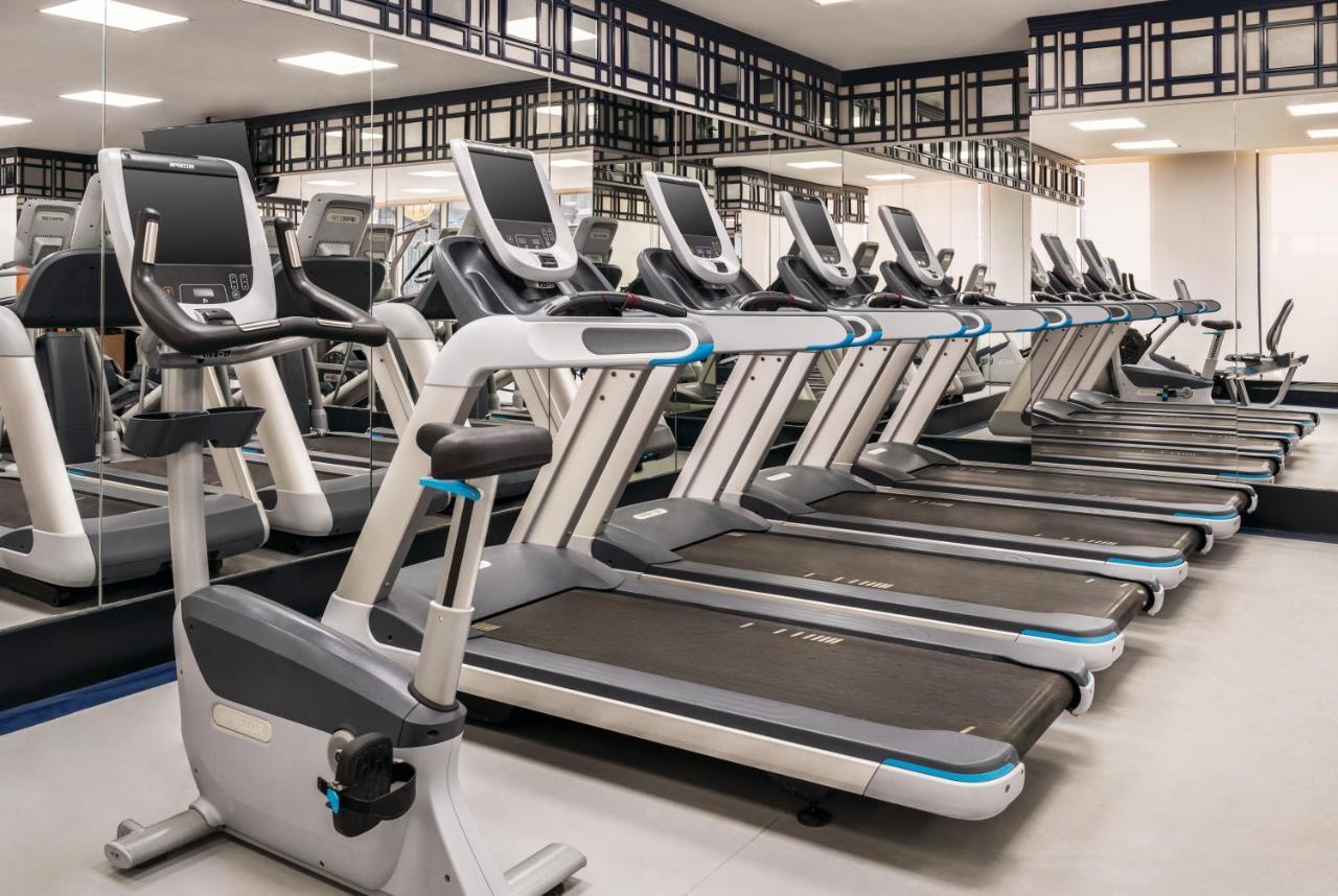 Wyndham Doha West Bay Hotel Exterior photo A row of treadmills