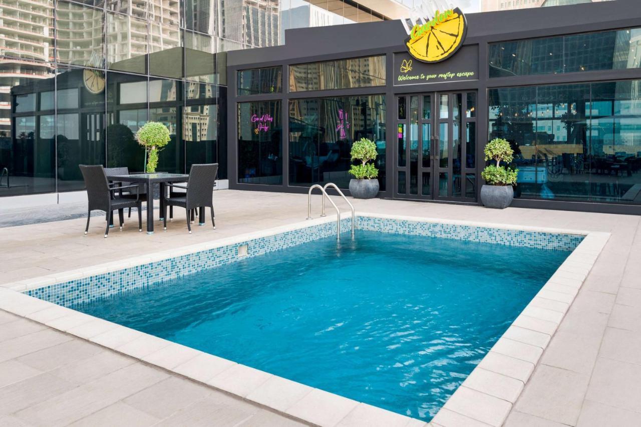 Wyndham Doha West Bay Hotel Exterior photo The Lemon Pool