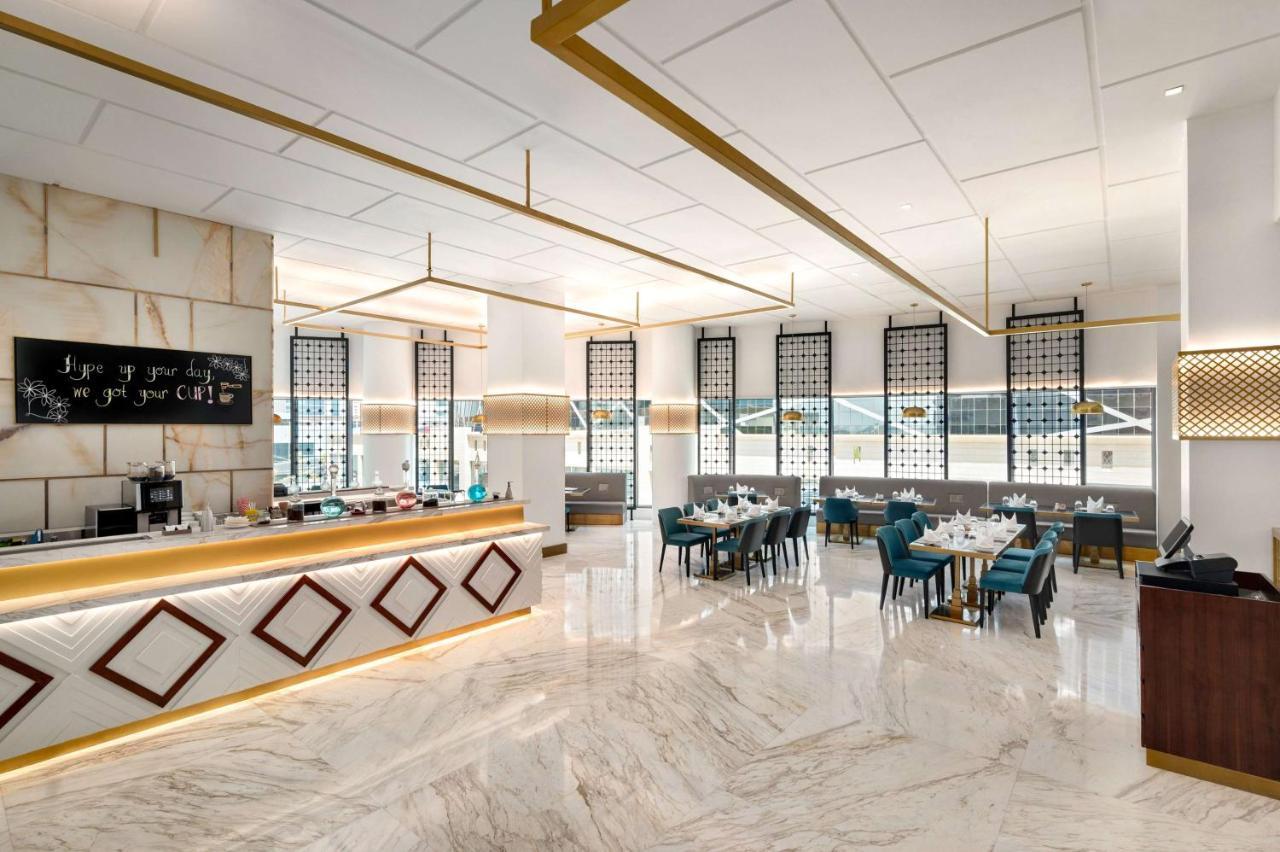 Wyndham Doha West Bay Hotel Exterior photo 3D rendering of a restaurant