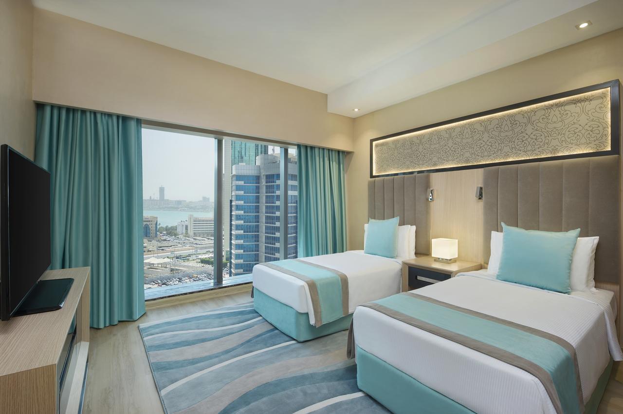 Wyndham Doha West Bay Hotel Exterior photo Deluxe Room