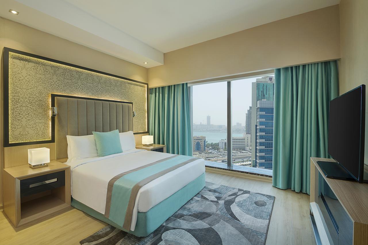 Wyndham Doha West Bay Hotel Exterior photo A bedroom at the hotel
